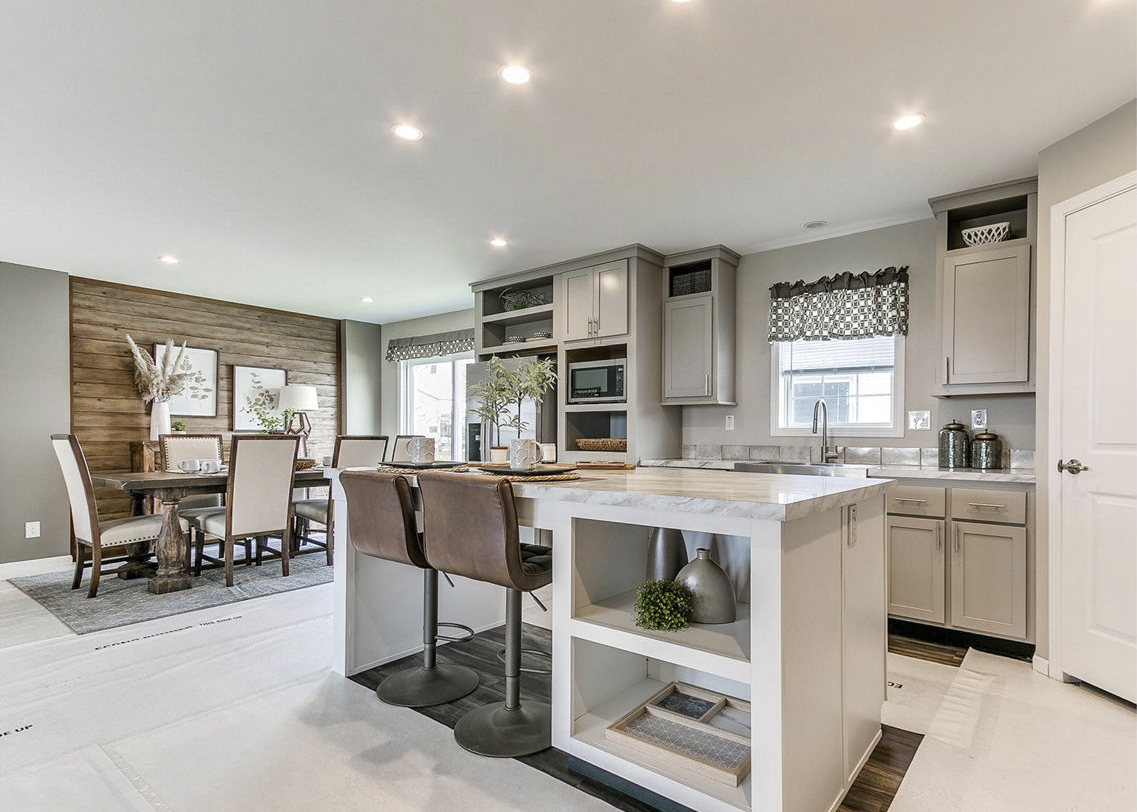 Modular home kitchen and dining room by Highland Manufacturing.