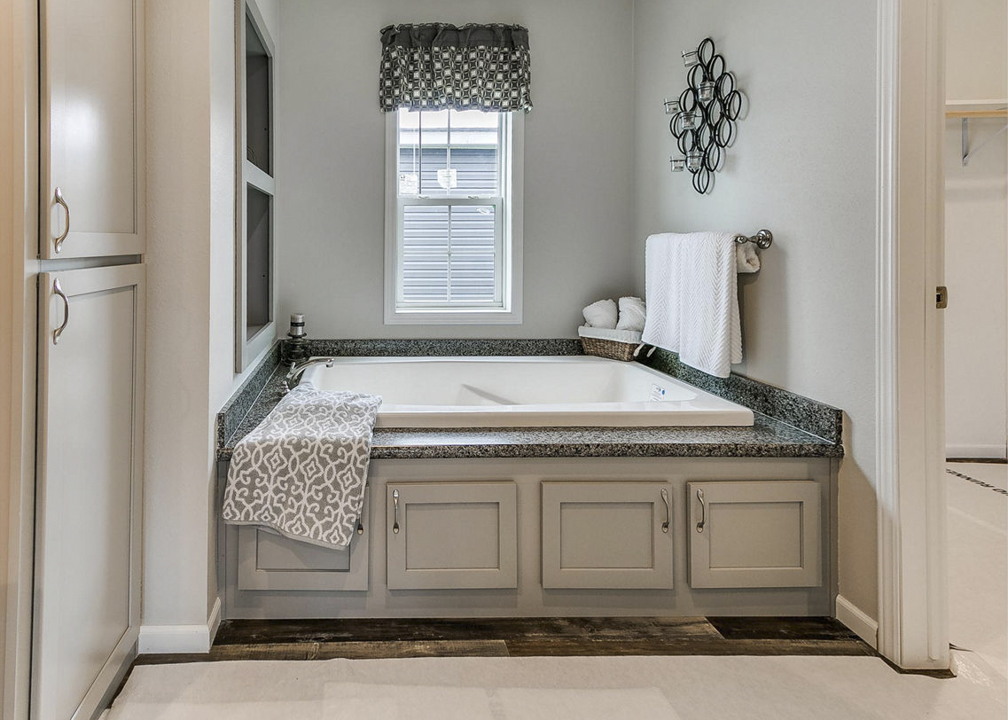 Modular home primary bathroom by Highland Manufacturing.