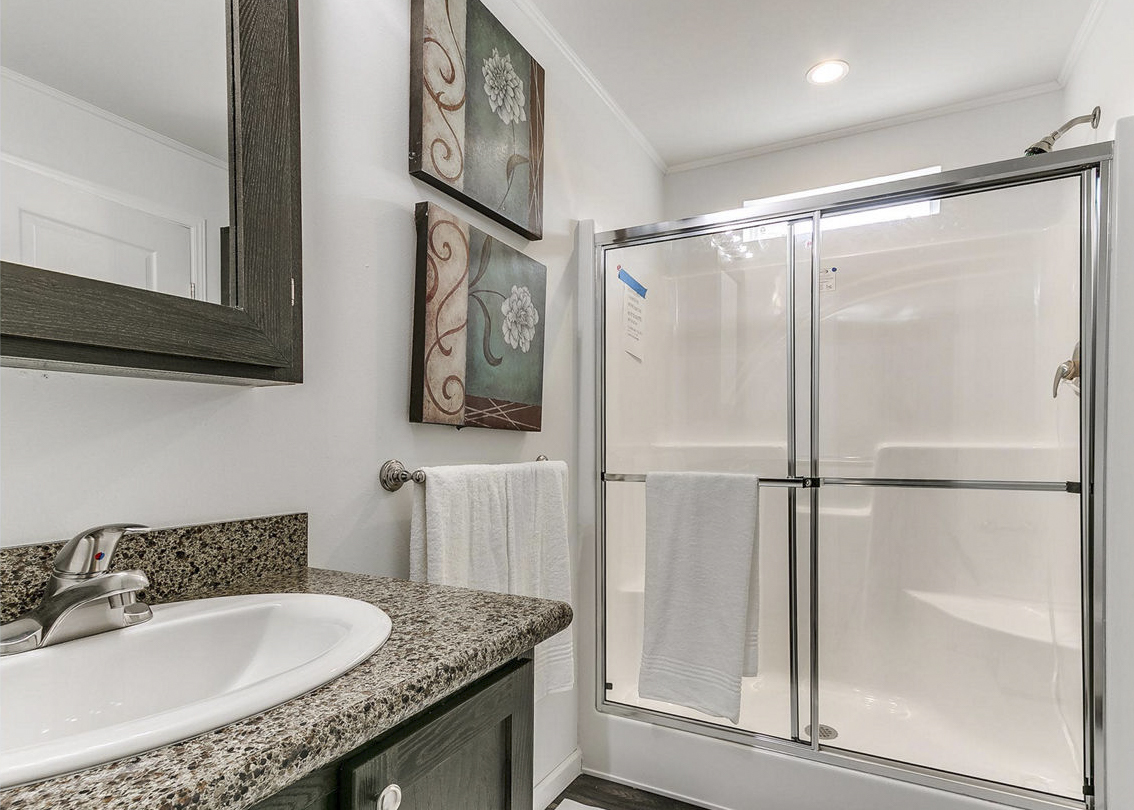 Modular home primary bathroom by Highland Manufacturing.